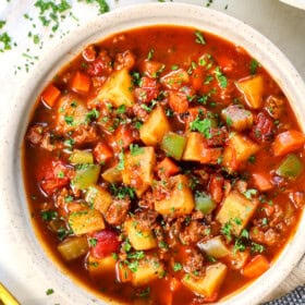 top view of hamburger soup garnished with parsley