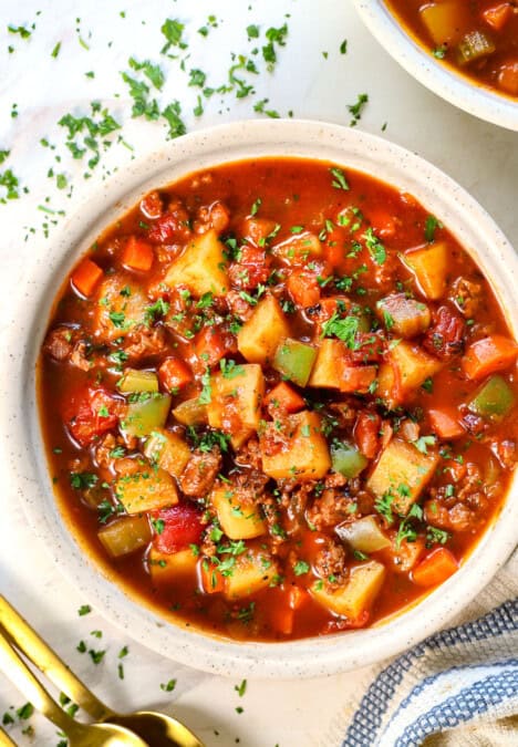 top view of hamburger soup garnished with parsley