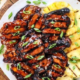 top view of teriyaki chicken on a plate showing the juicy chicken and teriyaki sauce