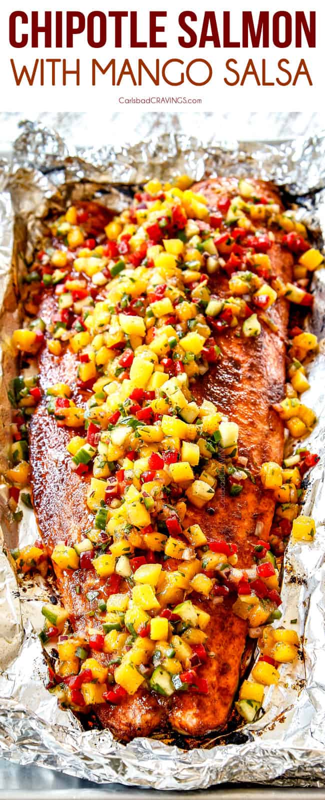 front view of a fillet of salmon with mango salsa