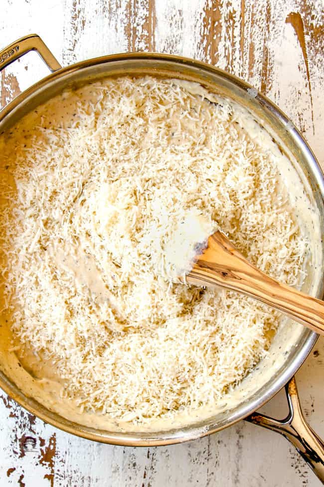 showing how to make Chicken Alfredo Bake by melting Parmesan in Alfredo Sauce