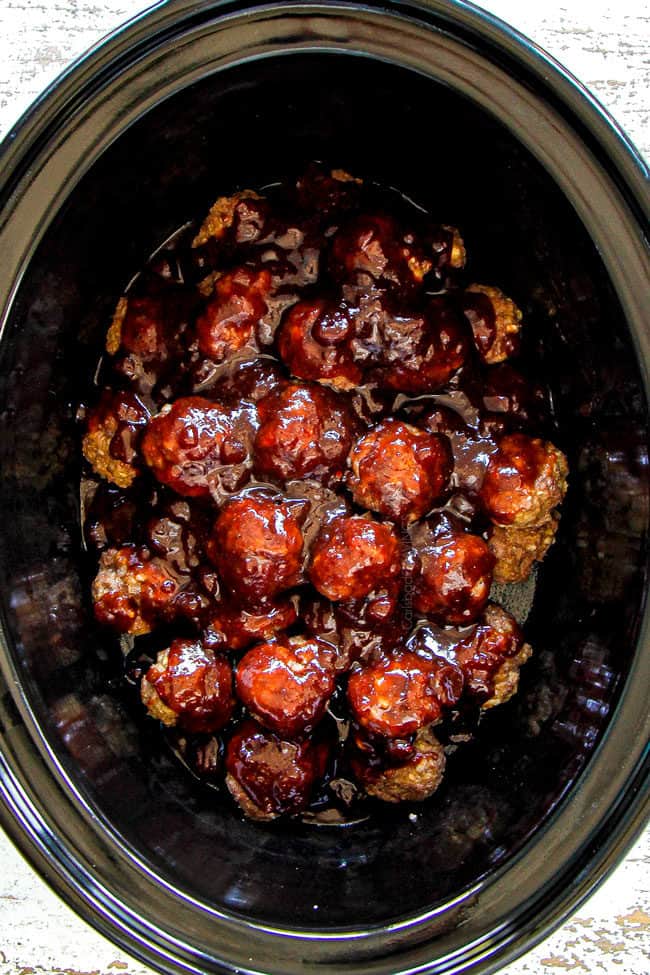 showing how to make easy cranberry meatballs by layering them with cranberry sauce before cooking