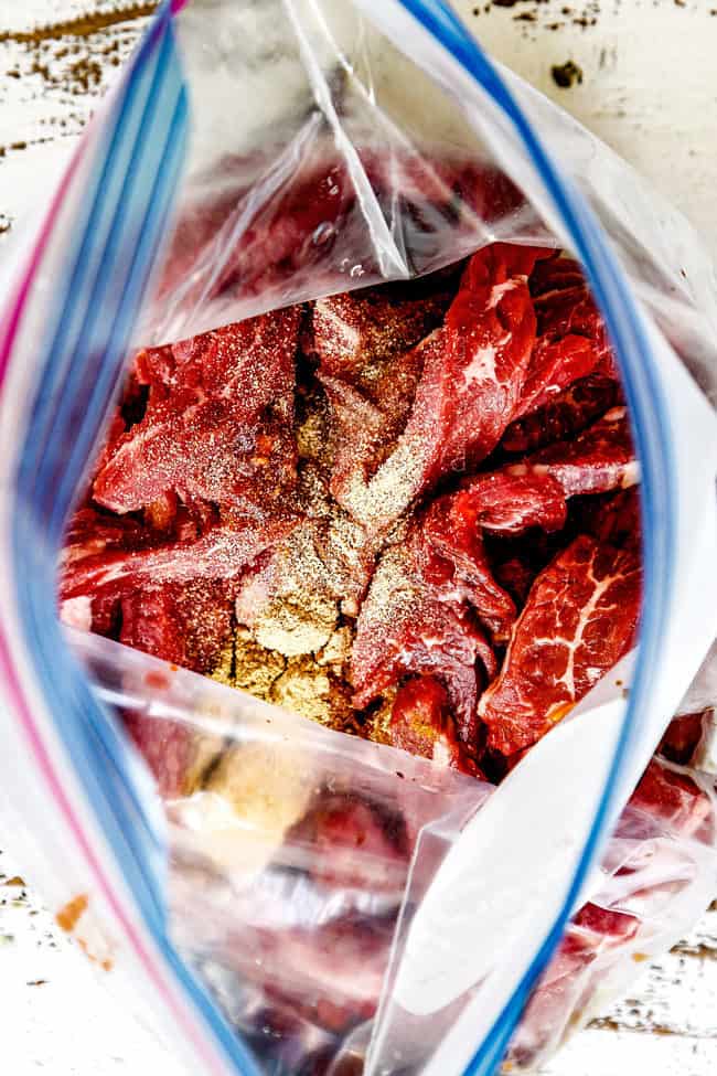 showing how to make Szechuan Beef by adding thinly sliced steak and marinade to a plastic bag