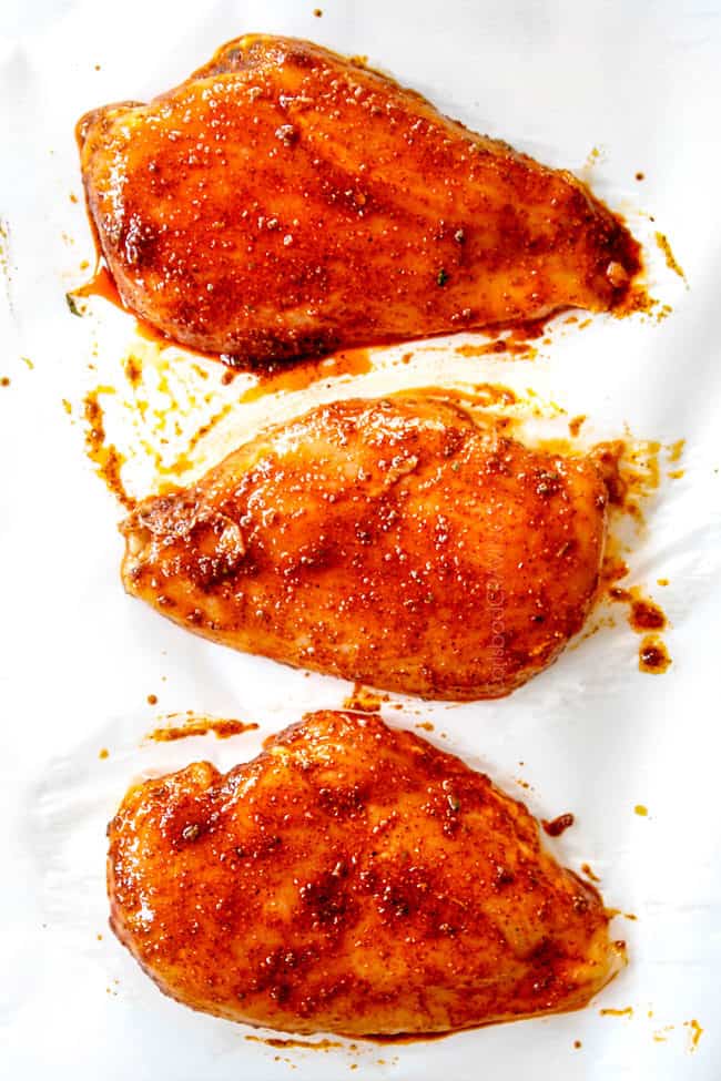 showing how to make fiesta lime chicken by marinating chicken