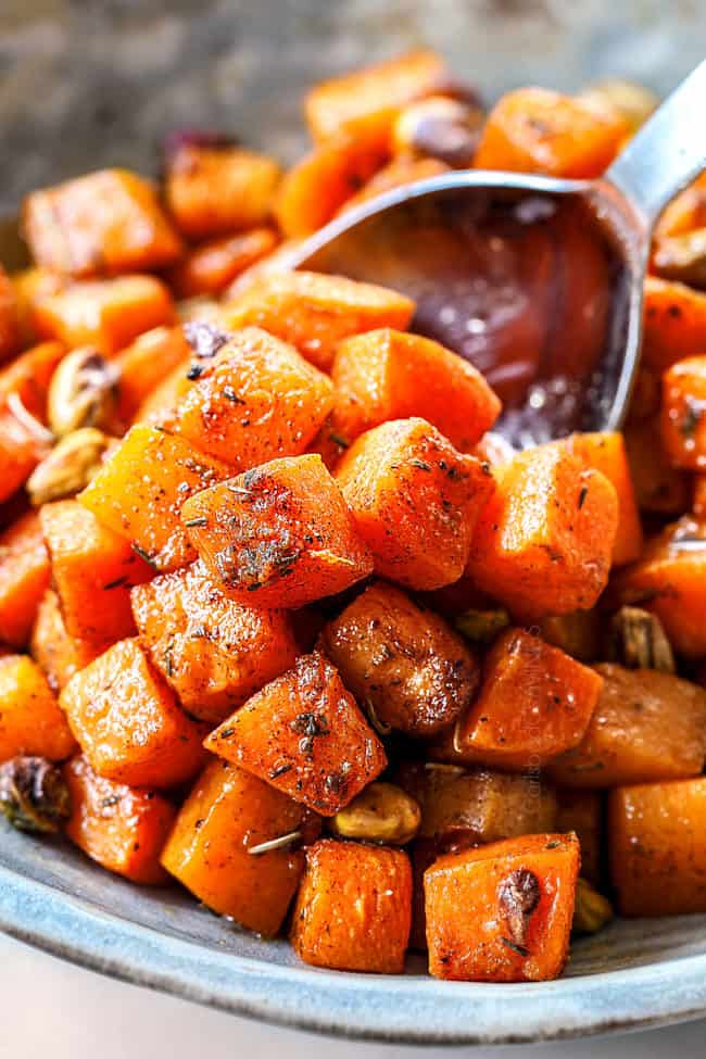 a bowl of up butternut squash with brown sugar in a bowl