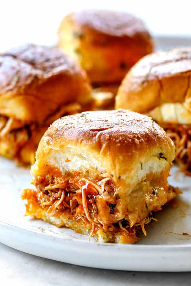 up close of buffalo chicken sliders showing what to make with crockpot buffalo chicken