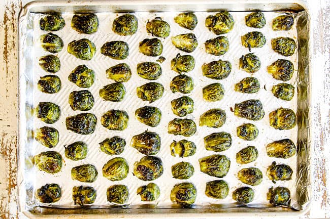 showing how to cook oven Roasted Brussels Sprouts by baking in the oven until crispy