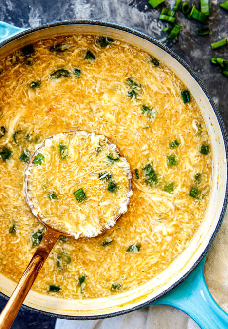 top view of a ladle full easy Egg Drop Soup recipe