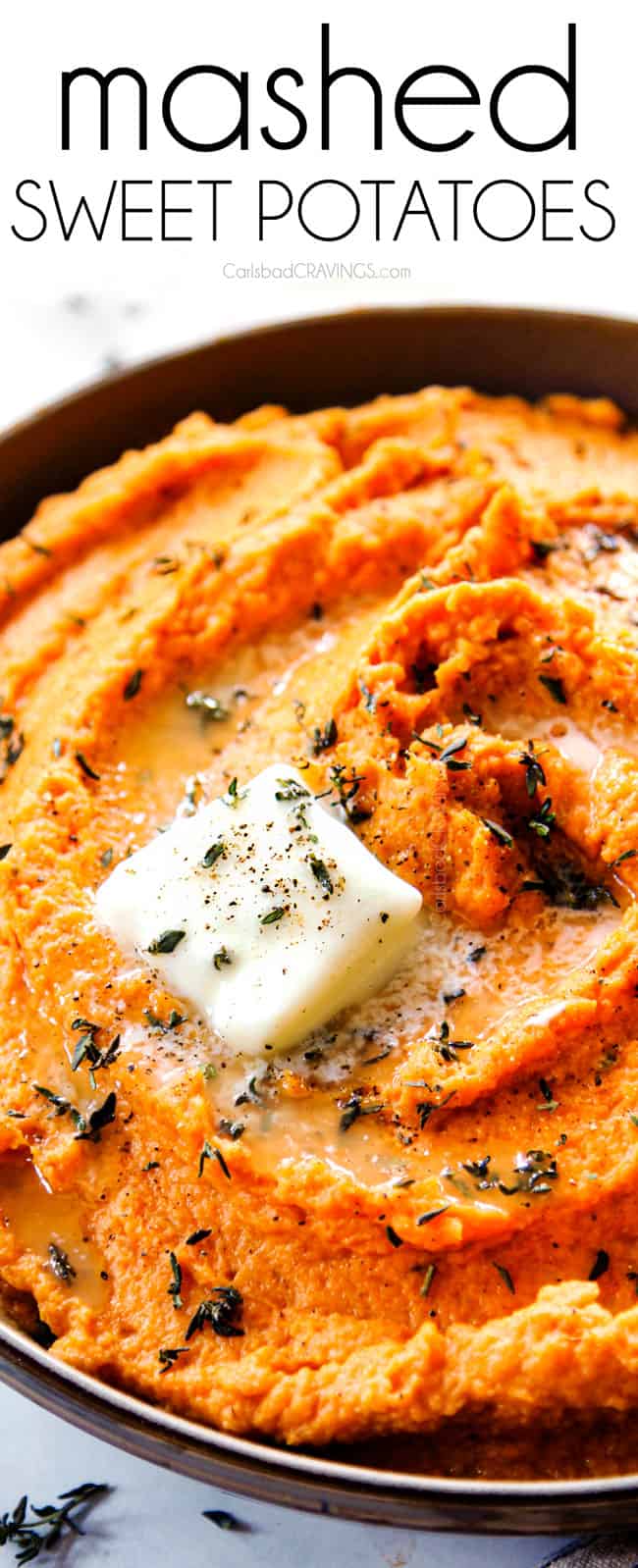 up close of easy mashed sweet potatoes in a black bowl