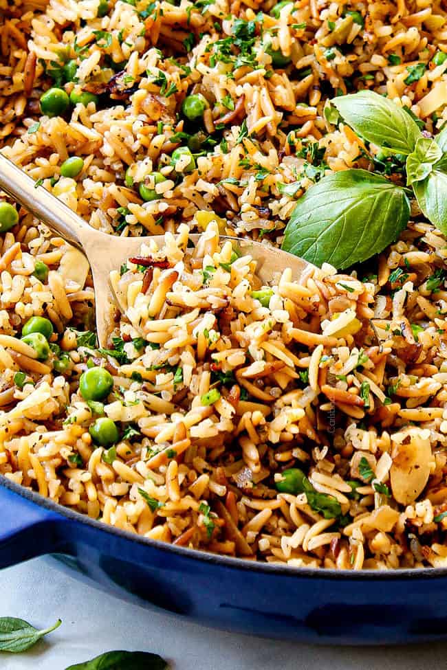 up close of a spoon stirring best rice pilaf recipe