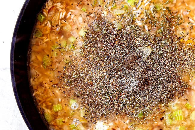 showing how to make rice pilaf by adding chicken broth and seasonings