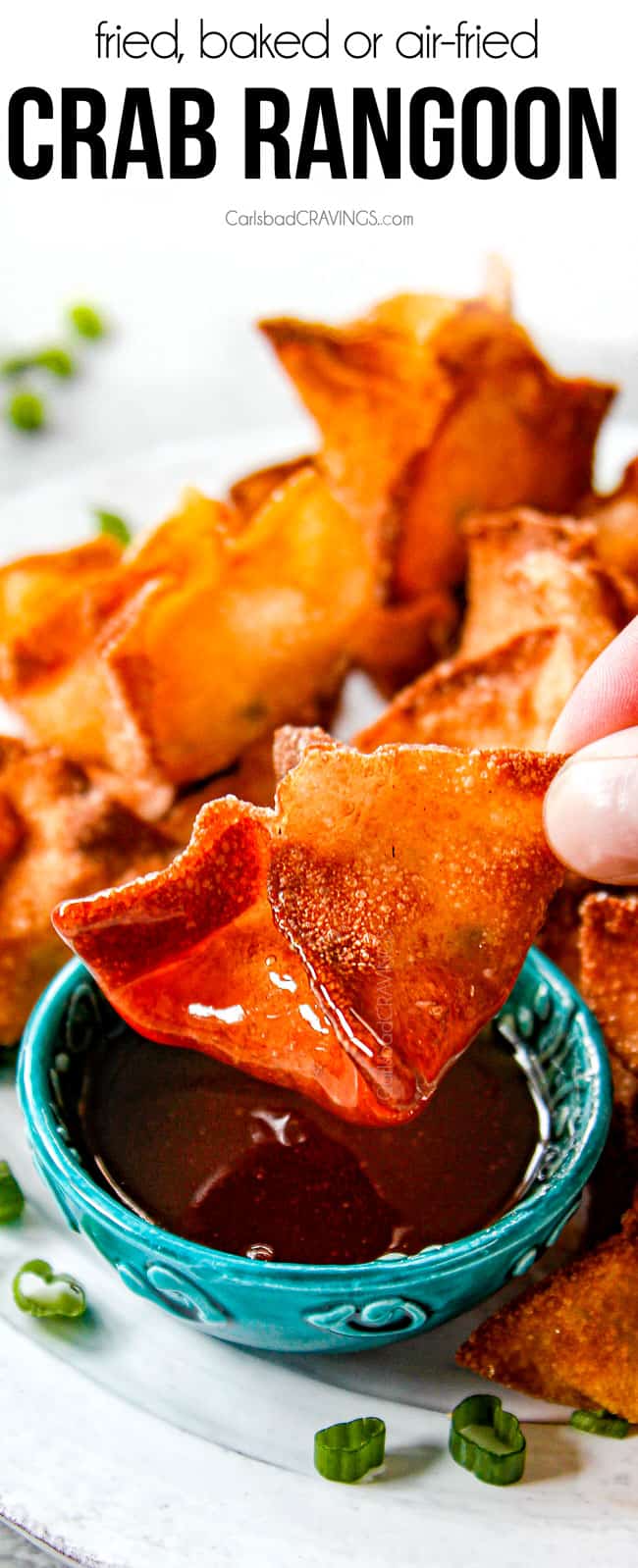 showing what to serve with homemade crab rangoon by dipping into sweet and sour sauce