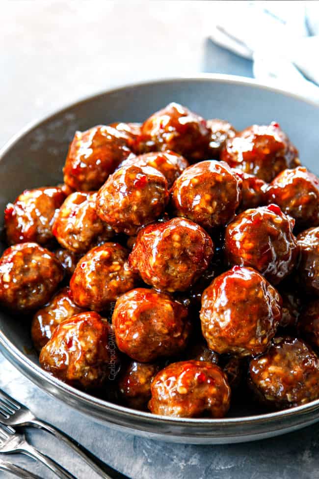 up close of serving cocktail meatballs in a bowl