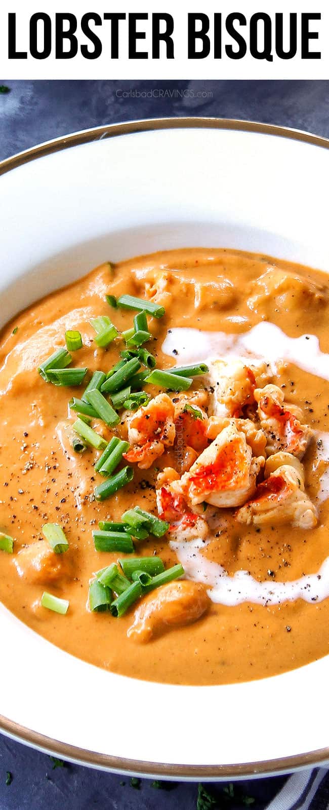 up close of serving best lobster bisque recipe in a white bowl 