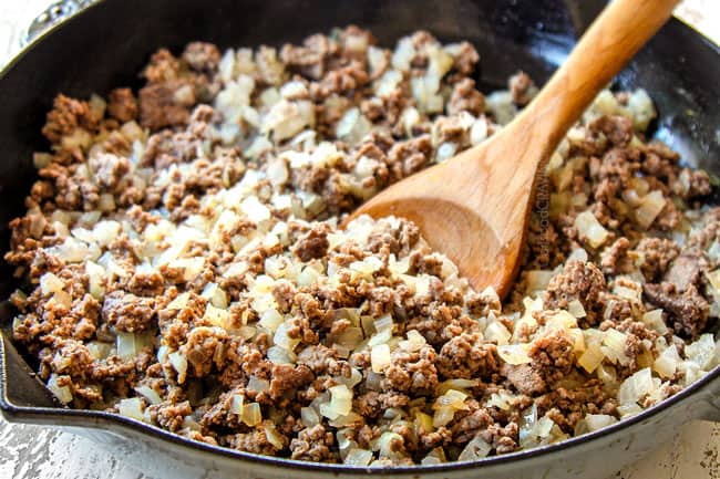 showing how to make ground beef stroganoff recipe by browning beef and onions