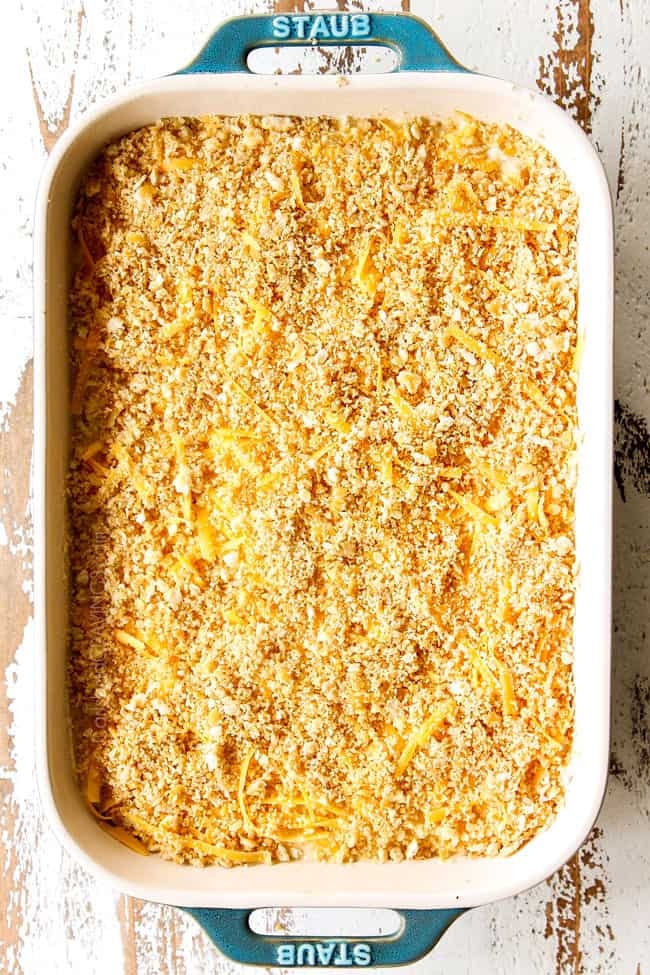 showing how to make hash brown casserole recipe by topping with crushed Ritz crackers or corn flakes