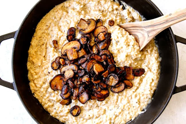 showing how to make mushroom risotto recipe by adding caramelized onions to cooked risotto