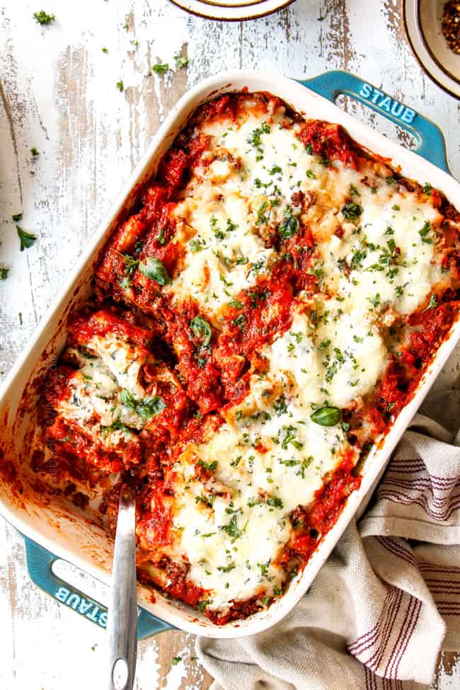 showing how to make easy Baked Ziti with ricotta, Italian sausage and meat by baking until the cheese melts and the pasta is hot