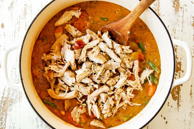 showing how to make chicken stew recipe by adding shredded chicken back to the white soup pot