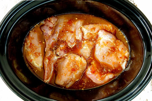 showing how to make Slow Cooker Honey Garlic by pouring sauce over chicken and cooking chicken until tender