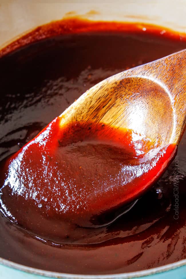 showing how to make homemade BBQ sauce recipe by simmering until thickened