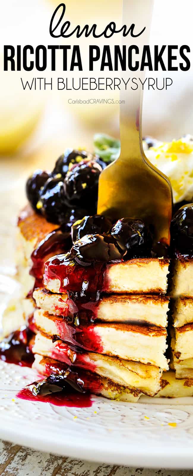 showing how to serve lemon ricotta pancakes by topping with blueberry sauce