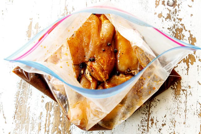 showing how to make Chicken Adobo recipe by adding chicken to a bag to marinate with soy sauce, vinegar, peppercorns and brown sugar
