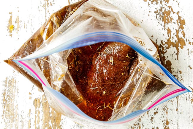 showing how to make marinated flank steak recipe by adding flank steak to a plastic bag