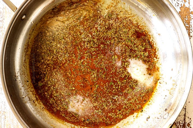 showing how to cook pork chops by adding brown sugar sauce to a skillet