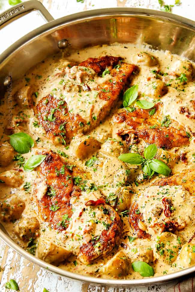 creamy Tuscan chicken with four chicken cutlets in a creamy Parmesan garlic sauce