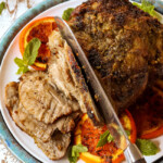 showing how to make mojo Cuban roast pork (lechon asado) by