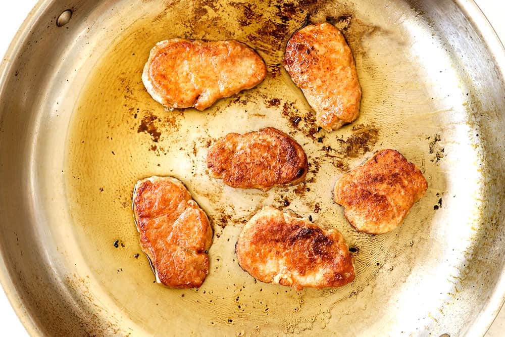 showing how to cook pork medallions by cooking pork tenderloin medallions in butter and oil in a stainless steel skillet