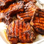 up close of grilled pork chops recipe showing how juicy they are