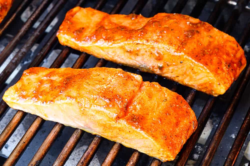 showing how to grill salmon by grilling flesh side down first