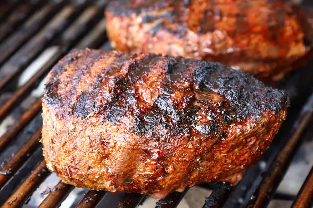 showing how to grill steak by grilling steak on a grill until seared