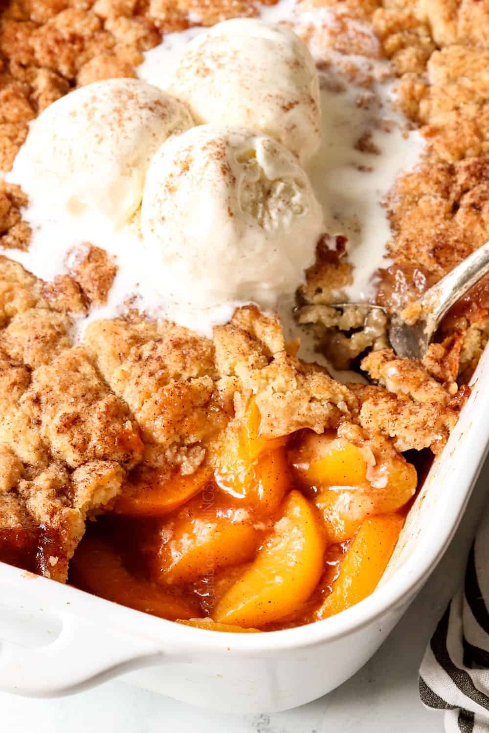 Peach Cobbler with the BEST Soft and Crispy Biscuit Topping