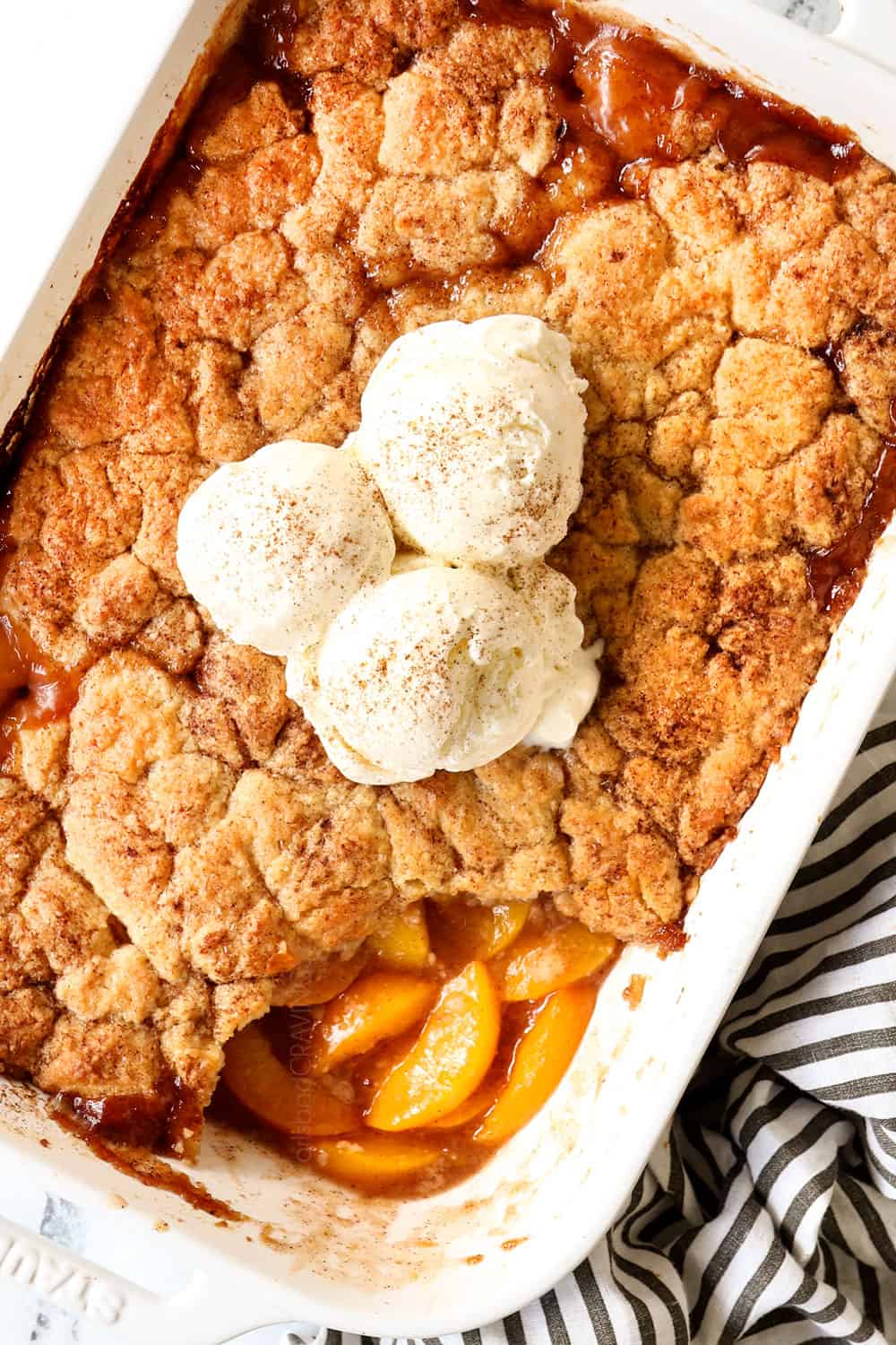 top view of easy peach cobbler recipe with biscuit topping