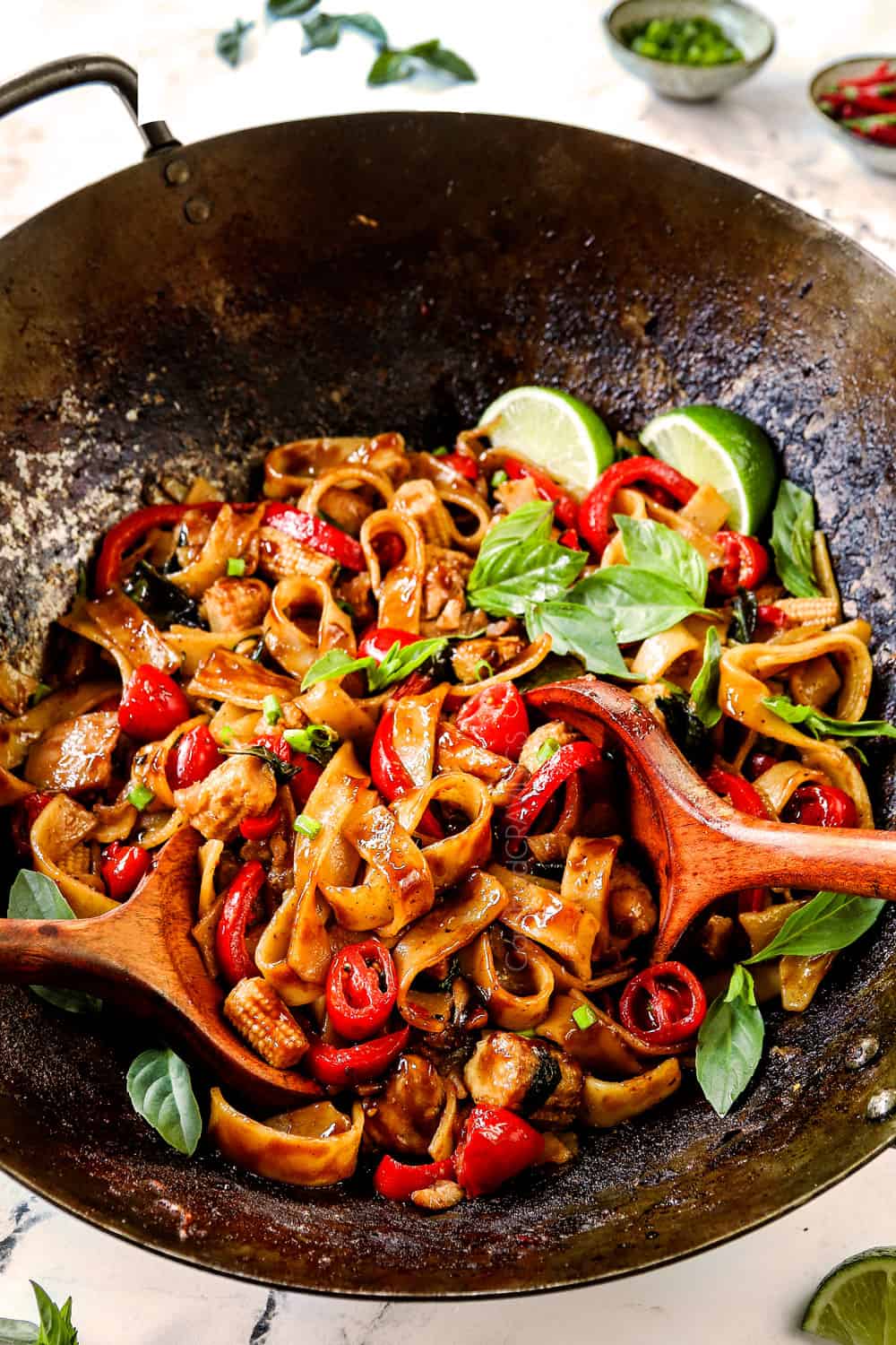 Drunken Noodles (Pad Kee Mao) recipe in a wok with wide rice noodles and chicken