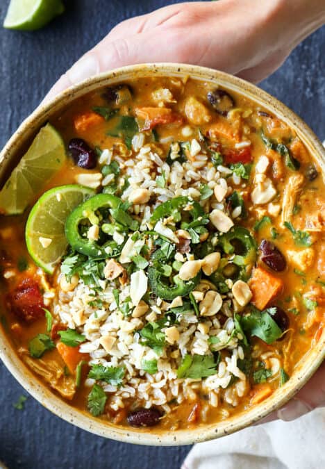 top view of African Peanut Stew with rice, cilantro and crushed peanuts