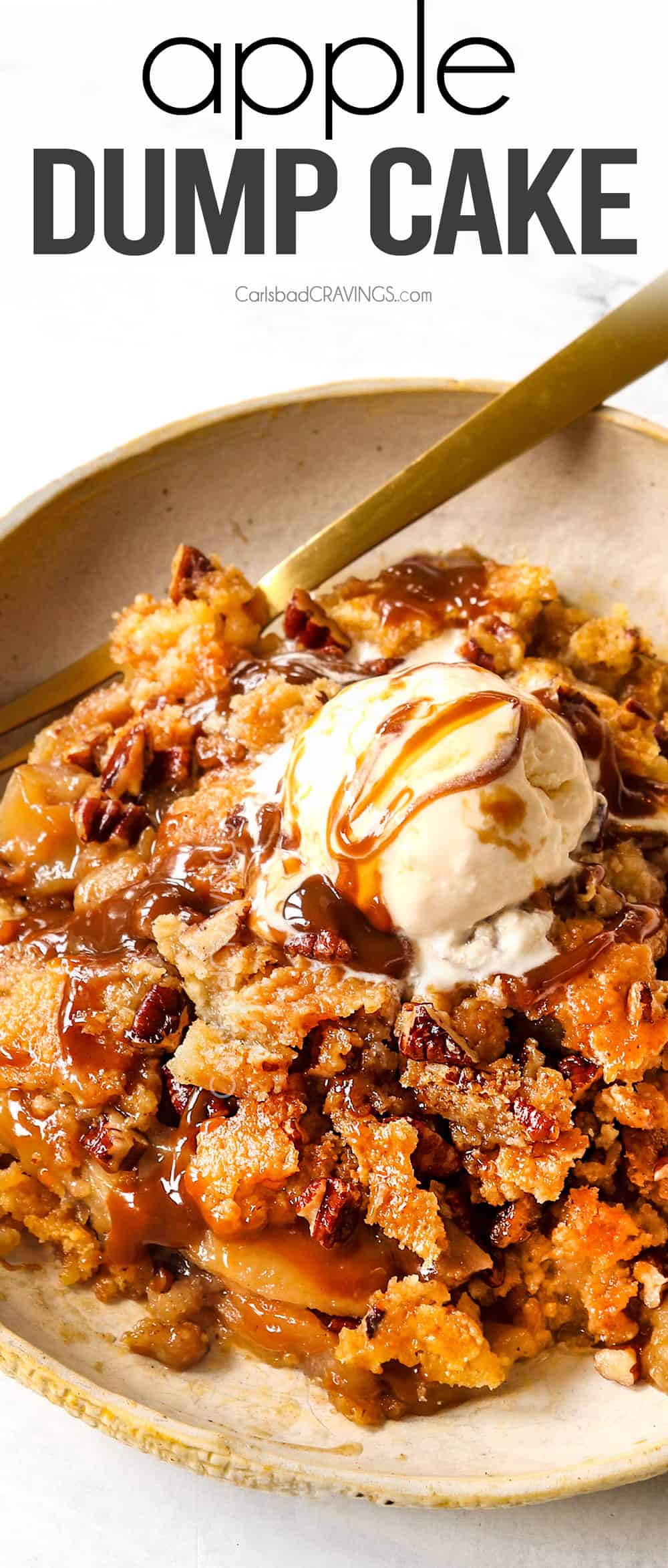 up close of apple dump cake on a plate with a scoop of ice cream