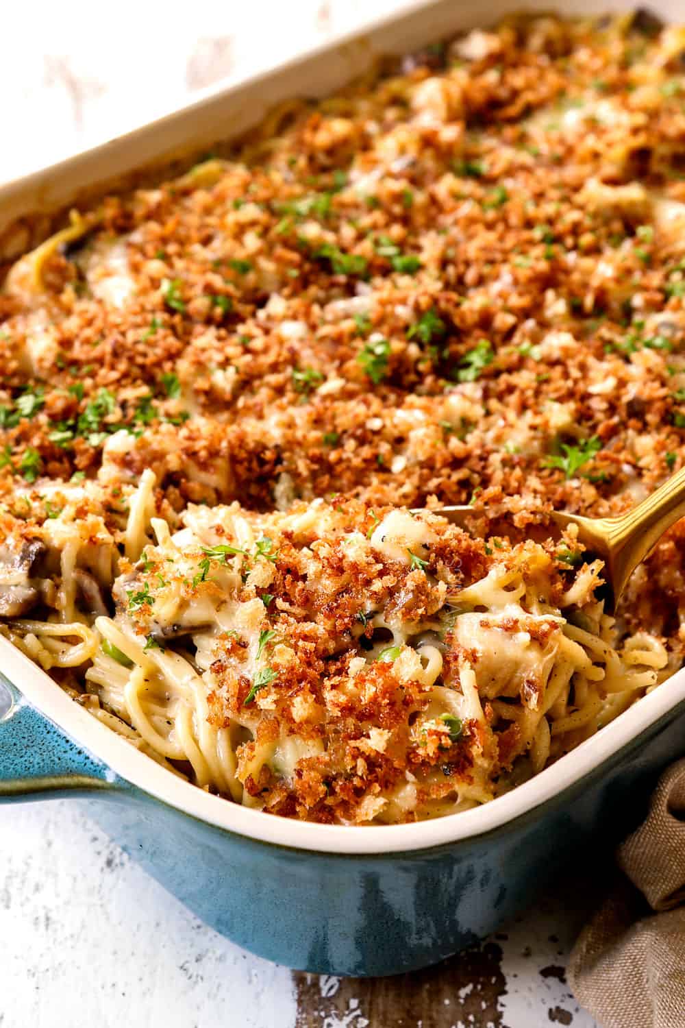 up close of scooping turkey tetrazzini recipe showing how creamy it is