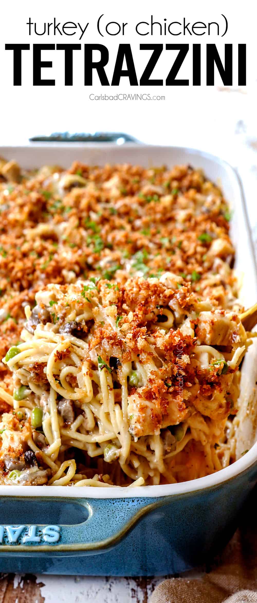scooping up turkey tetrazzini recipe with a spoon to serve