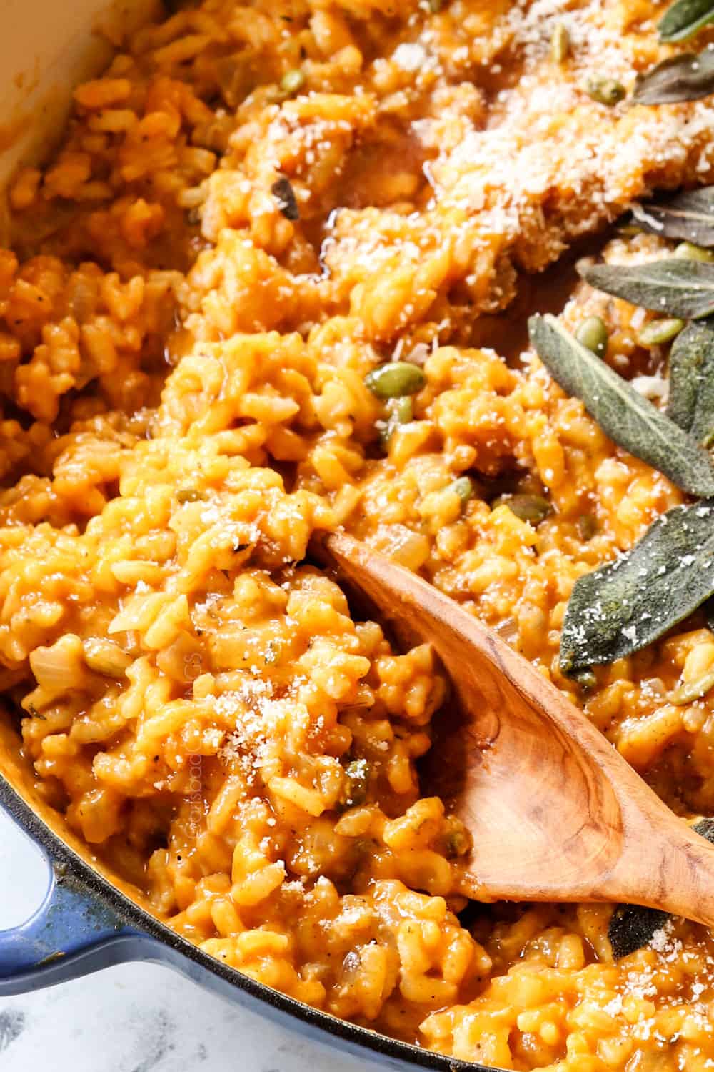 up close of a spoonful of pumpkin risotto recipe showing how creamy it is