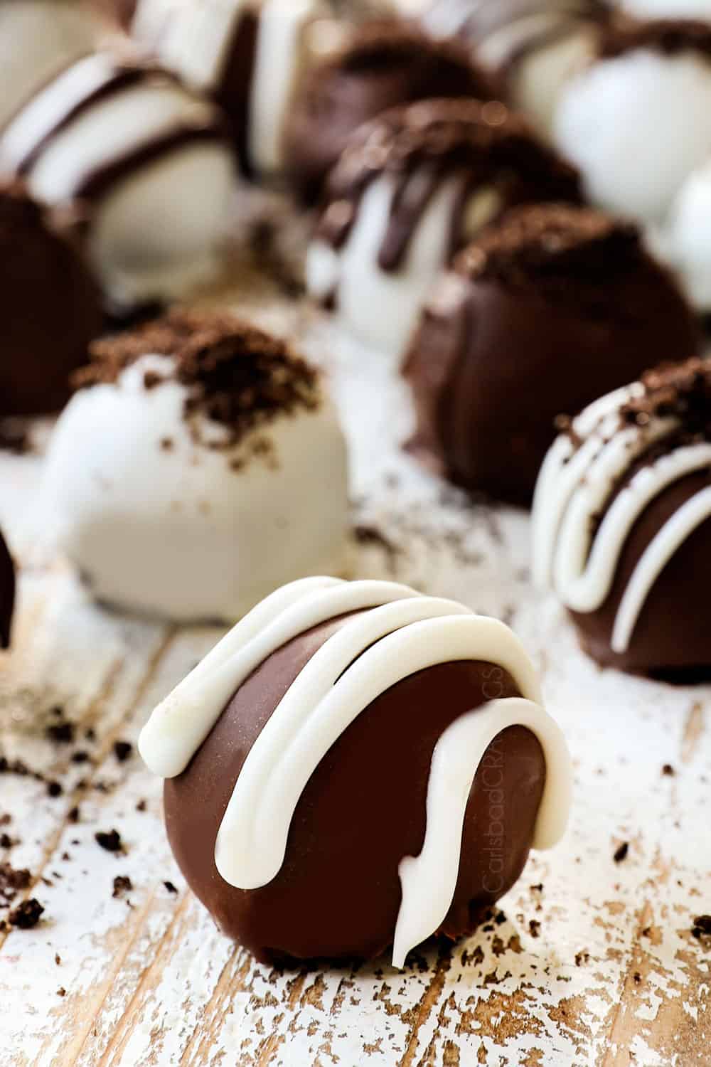 Oreo Balls drizzled with chocolate