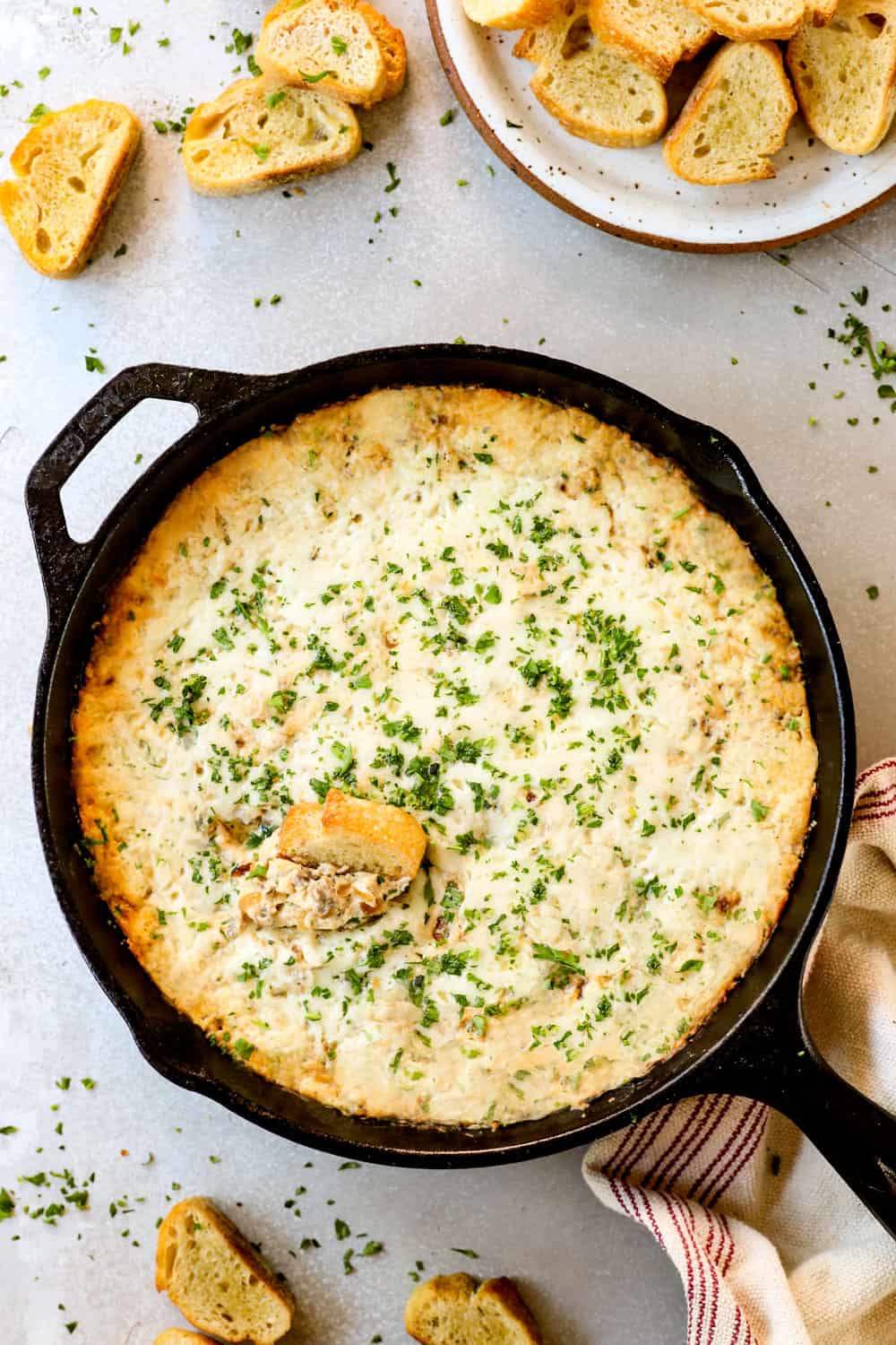 top view of hot Philly cheesesteak dip recipe in a cast iron skillet showing what pan to use