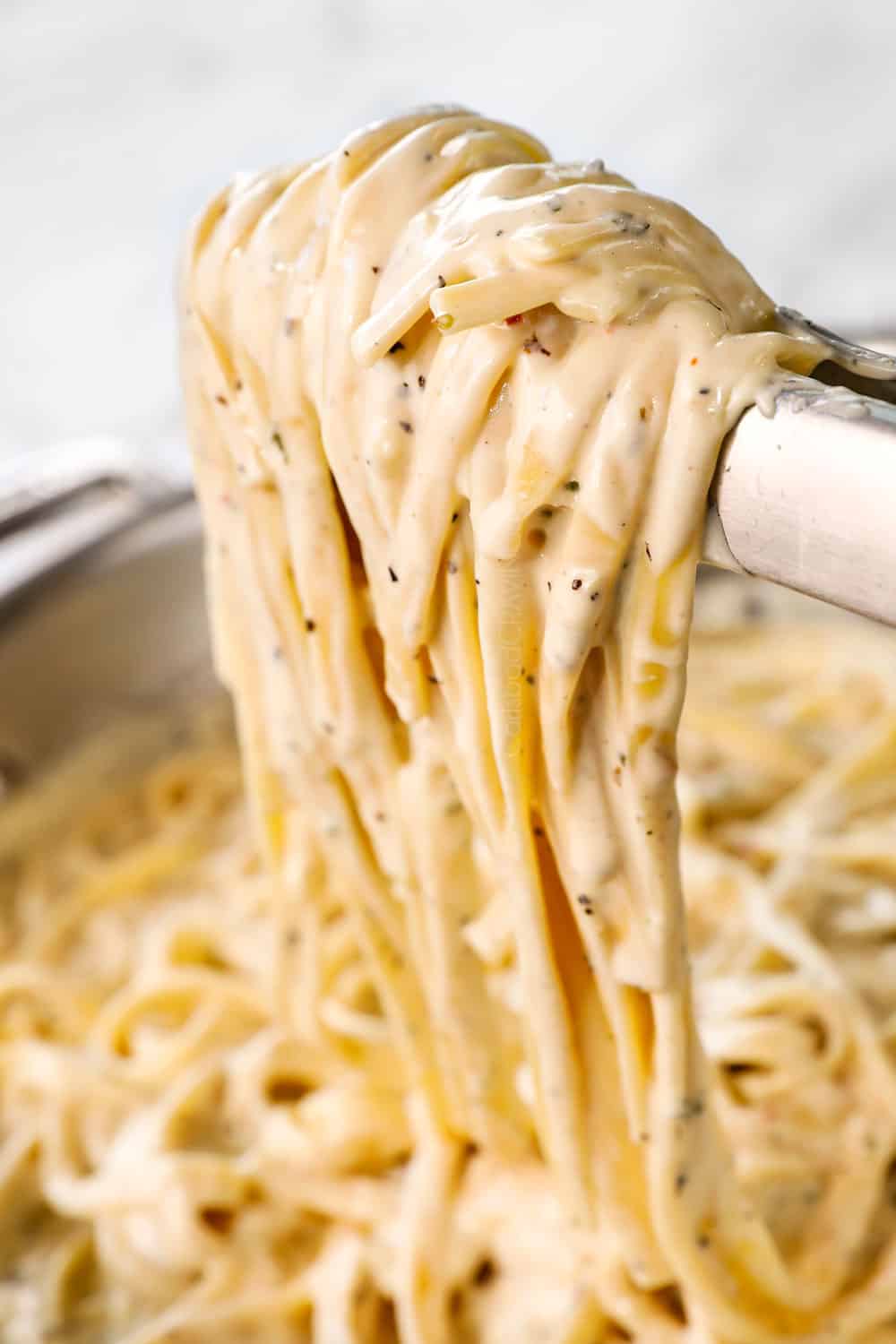 alfredo by tossing the pasta with the Alfredo sauce