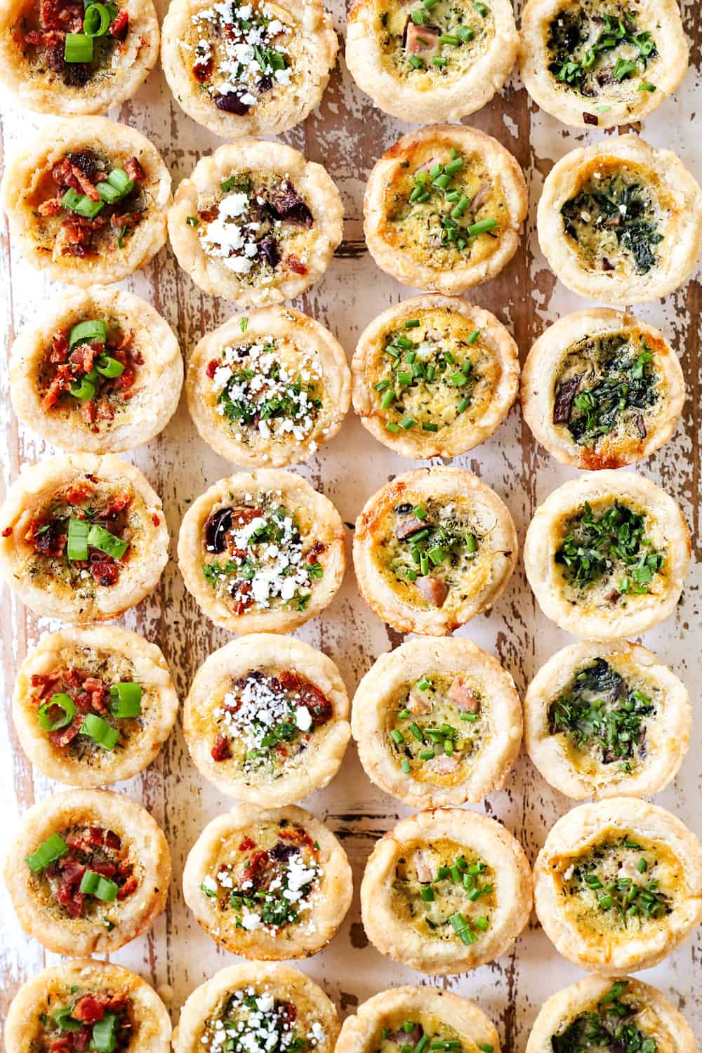 4 rows of mini quiche showing the different kinds to make in this recipe