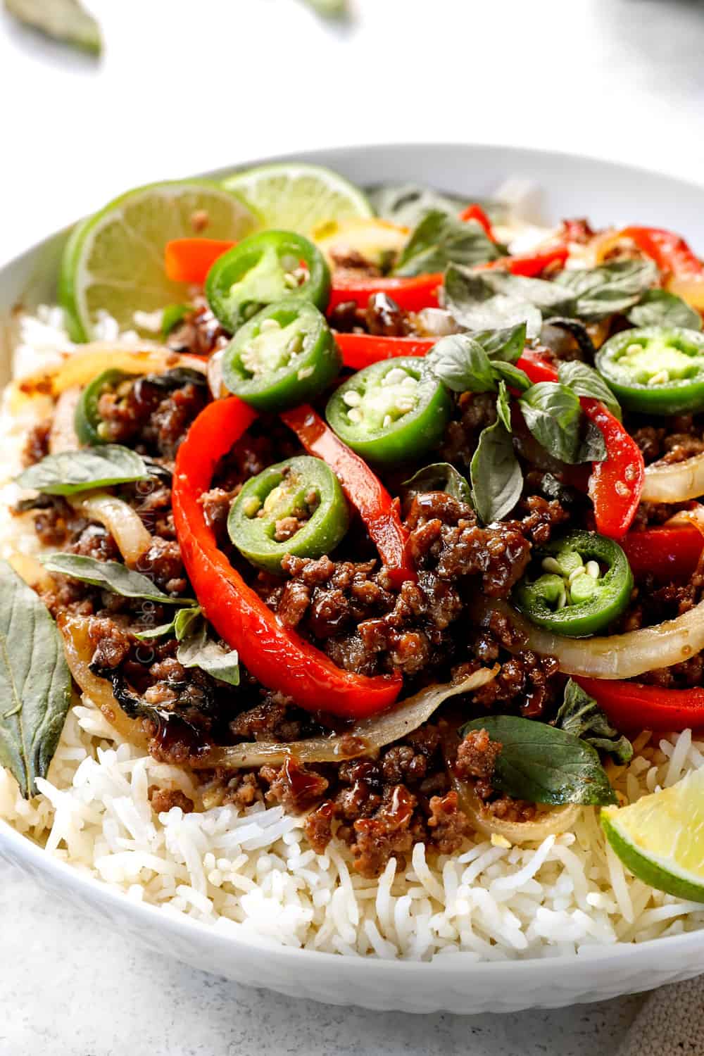 up close of Thai Basil Beef ( Pad Gra Prow) in a bowl of rice