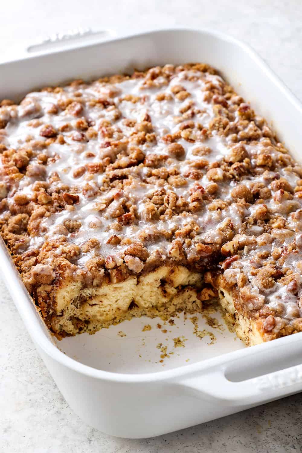 cinnamon roll French toast bake with a slice cut out 