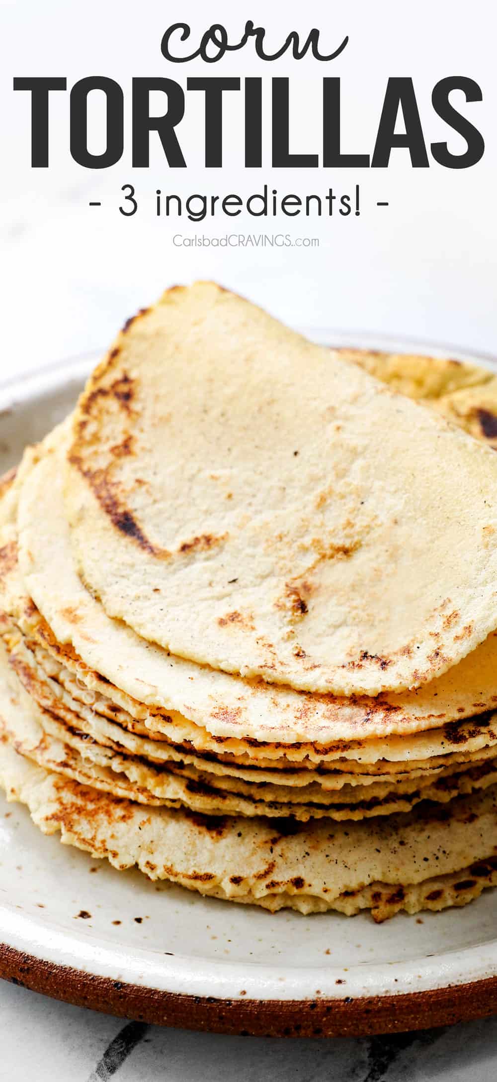 a stack of homemade corn tortillas showing how pliable they are